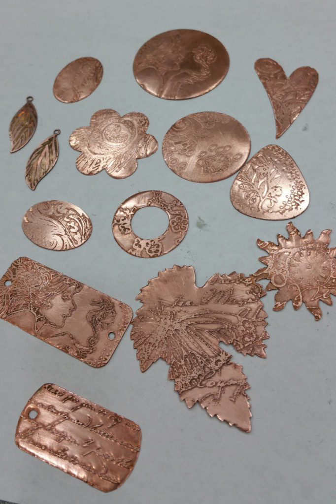 Etched copper blanks ready for enamel