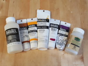 acrylic pouring supplies: paint, liquid silicone, and liquitex pouring medium